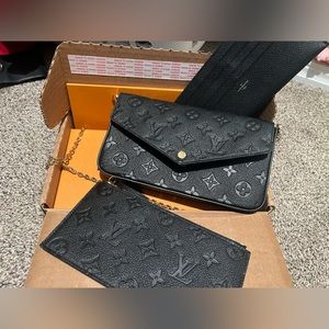 New felicie Pochette with box. Never been used.